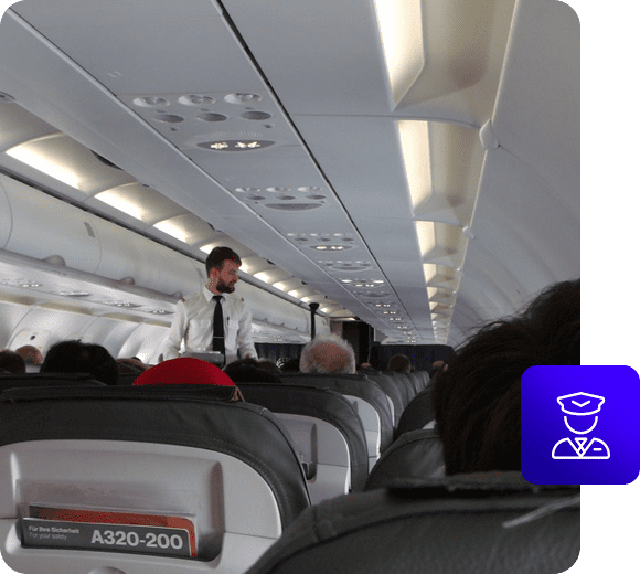 A man standing on an airplane with people sitting in the back.